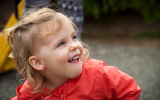 a little girl laughing