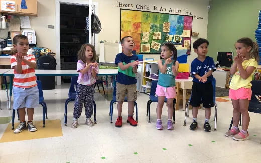 a group of children in a classroom