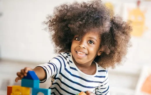 a child playing with a toy