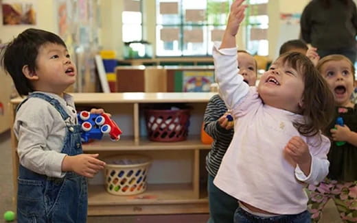 a group of children laughing