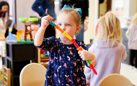 a young girl brushing her teeth