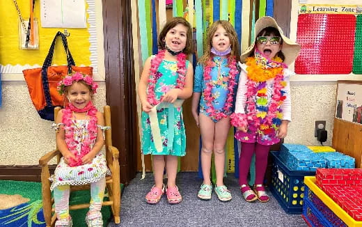 a group of children wearing clothing