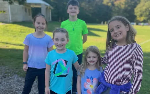 a group of children posing for a photo