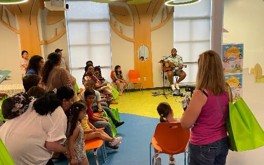 a group of people sitting in a room