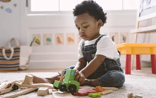 a child playing with a toy