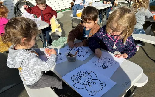 children sitting at a table