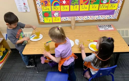 children eating at a table