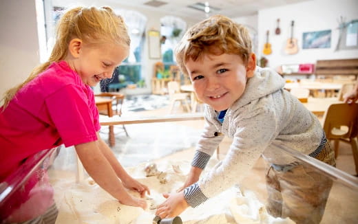 a few children working on a project