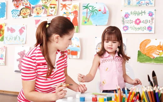 a person and a girl painting