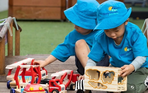 a couple of kids playing with toys