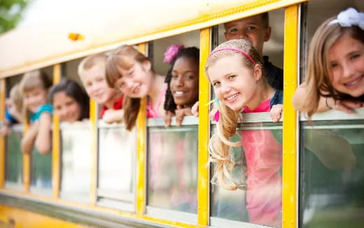 a group of children in a school bus