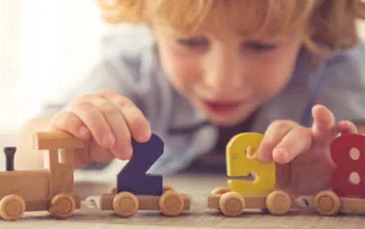 a child playing with a toy