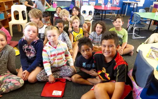 a group of children sitting together