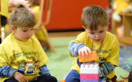 a few young boys playing with toys