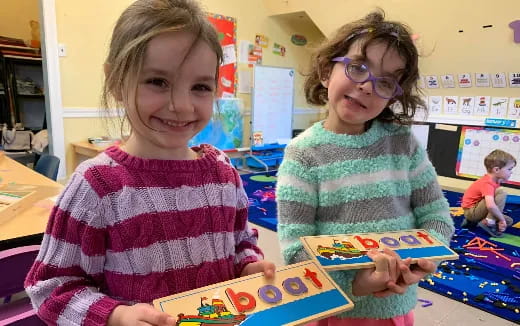 a couple of children playing with toys