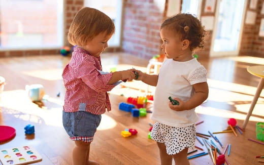 two children playing with toys