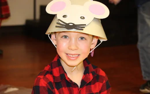 a child wearing a hat