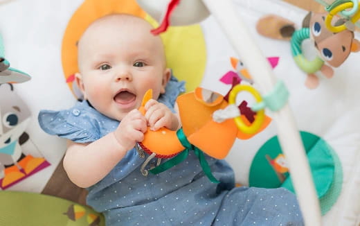 a baby is eating a banana