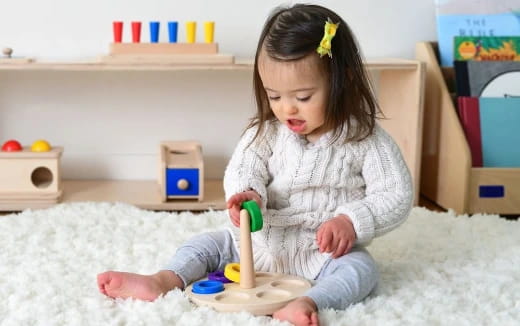 a girl sitting on the floor