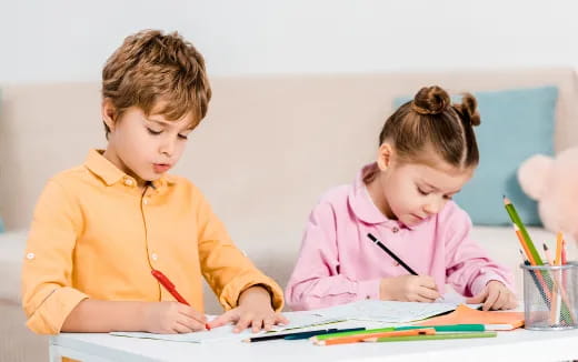 a few children studying together