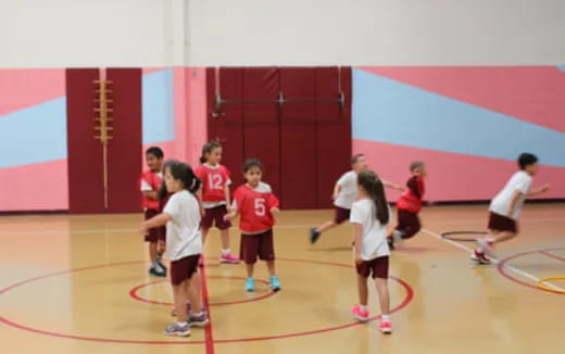 a group of kids playing a sport