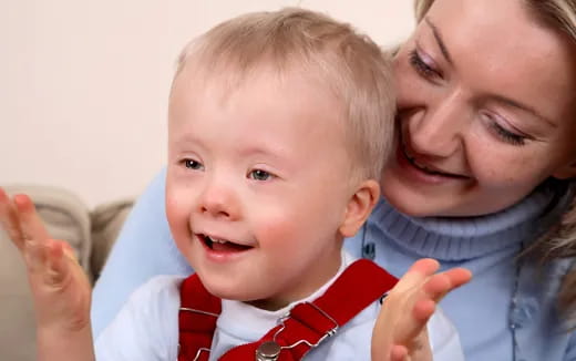 a person holding a baby