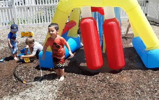 kids playing in a sandbox