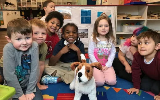 a group of children and a dog