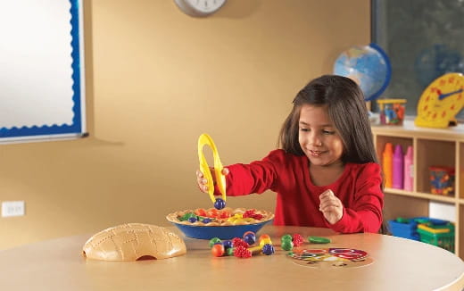 a girl eating a banana