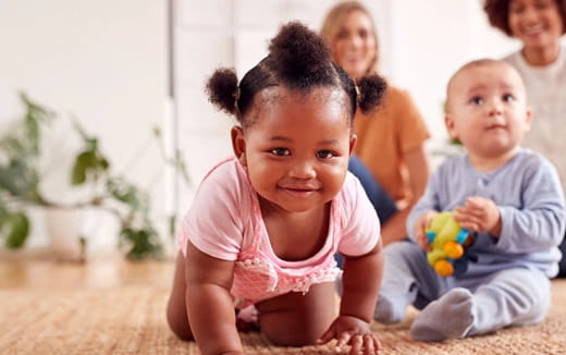 a group of children sitting on the floor