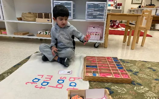 a child playing with a board game
