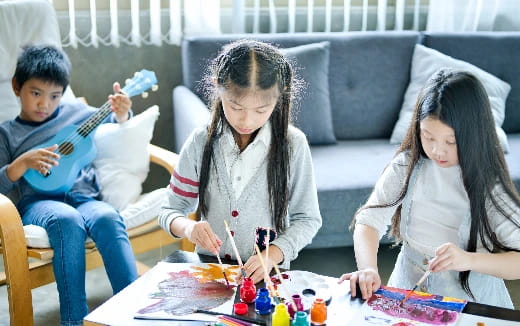 a group of children playing a board game