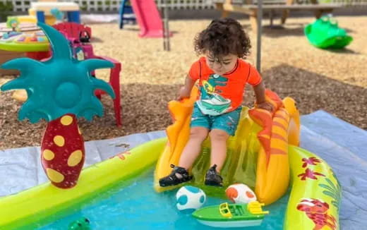 a child playing in a playground