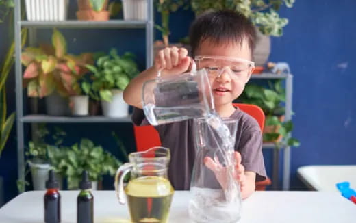 a person drinking from a glass