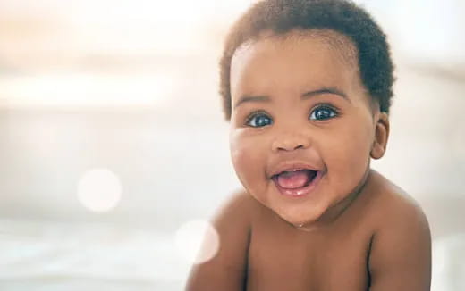 a baby with a surprised expression