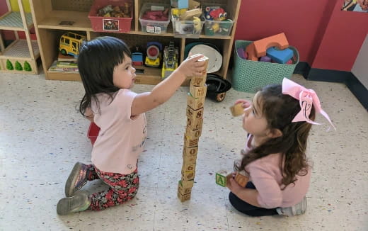 a couple of young girls eating