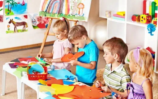 a group of children playing with toys