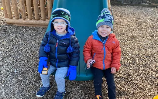 two children wearing winter clothes