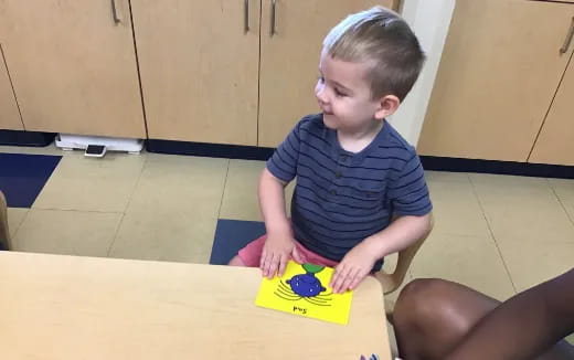 a child playing with a toy