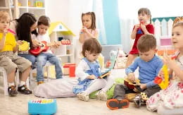 a group of children sitting on the floor