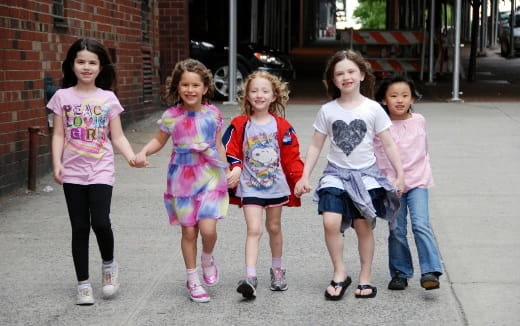 a group of girls walking
