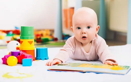 a baby sitting on a table