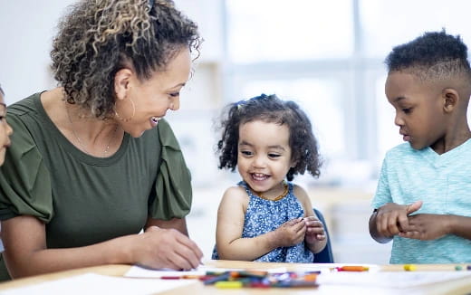 a man and a child looking at a paper