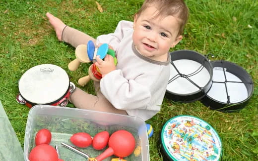 a baby playing with a toy