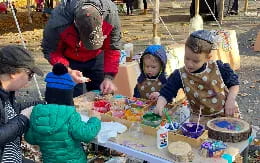 a group of children playing with toys