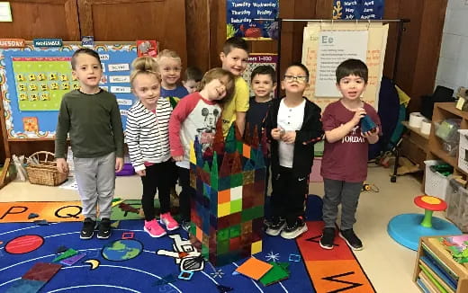 a group of children posing for a photo