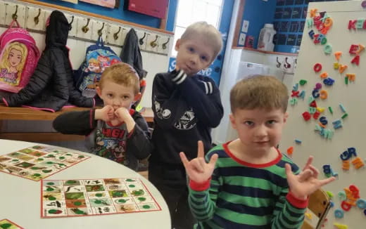 a group of children in a classroom