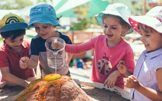 a group of kids wearing hats