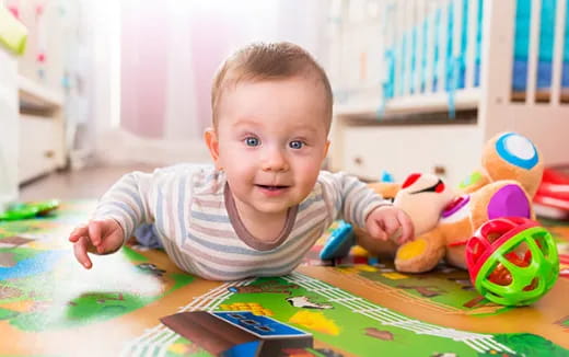 a baby playing with toys