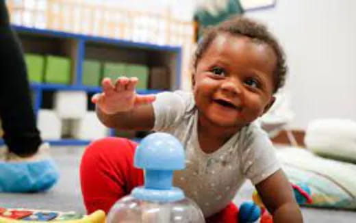 a baby with a bottle